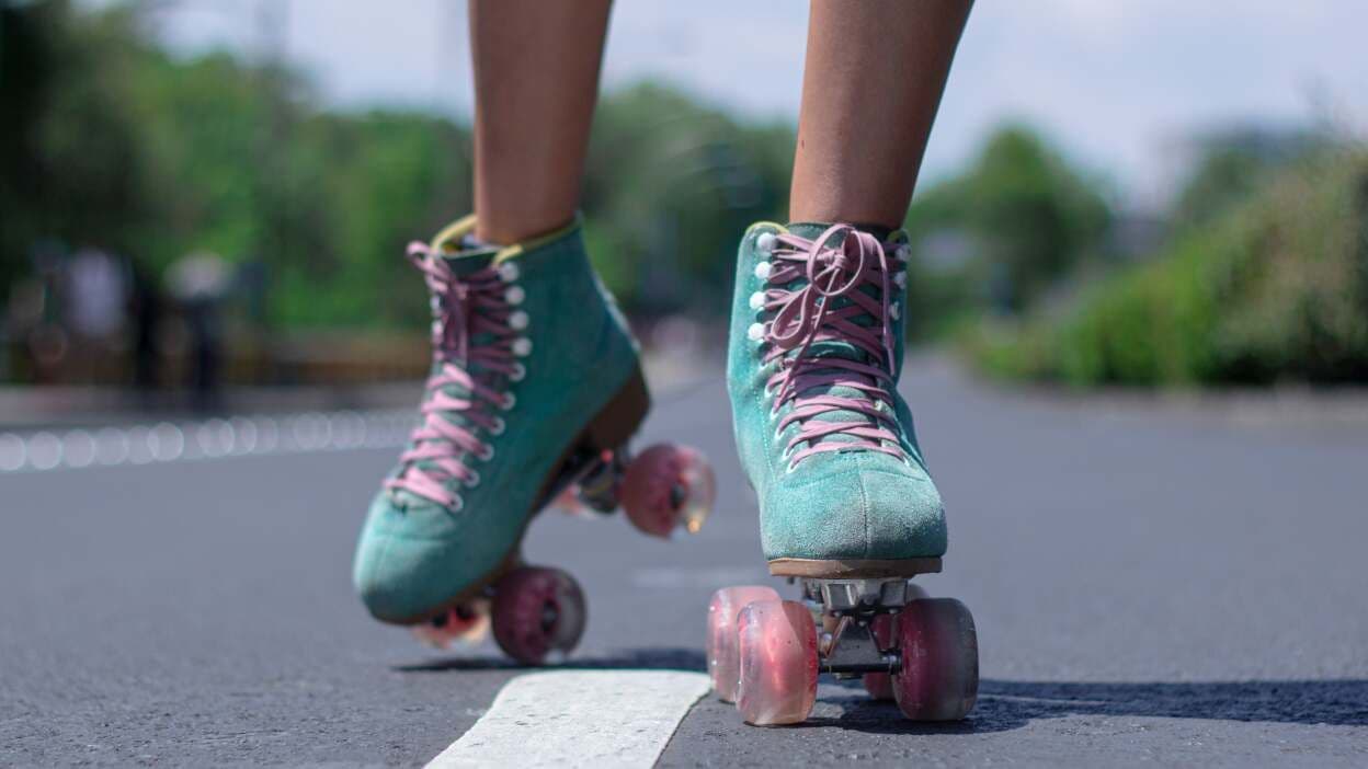 A pair of skates being used on the road